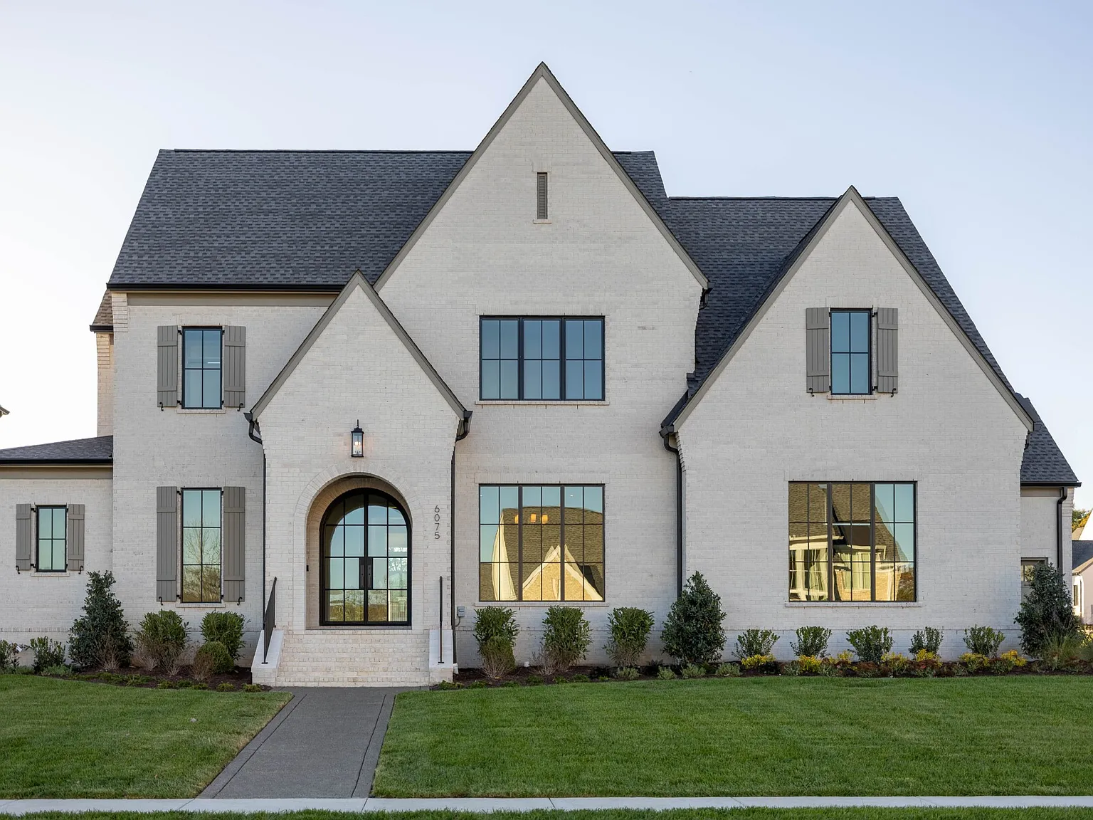 A white brick home by legend homes